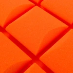 Zbliżenie na strukturę pomarańczowej pianki akustycznej Kostka Wypukła 3D