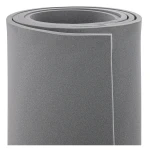 Ustawiona w pionie rolka szarej pianki akustycznej o grubości 20mm.