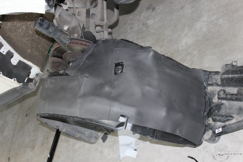 Subaru Forester plastikowe nadkole wyklejone pianka kauczukowa